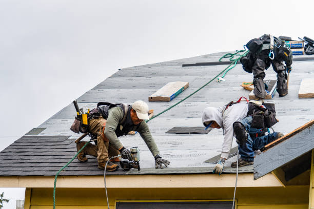 Professional Emergency Roof Repair technician working in Lee, MA
